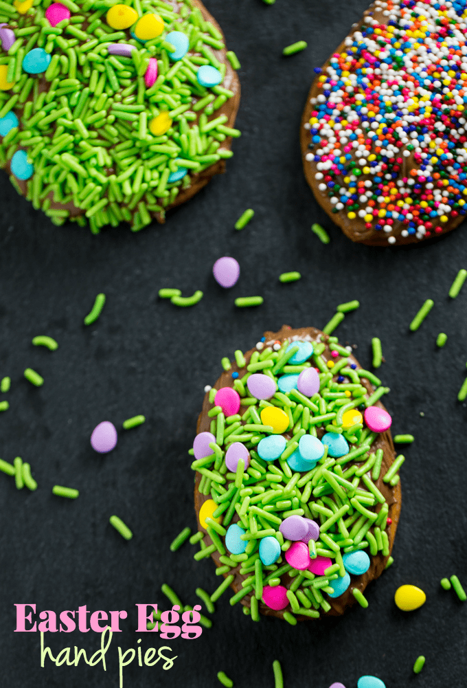 Easter Egg Hand Pies - Super easy Easter dessert made with refrigerated pie crust, melted chocolate and sprinkles! A fun Easter recipe for the kids to make.