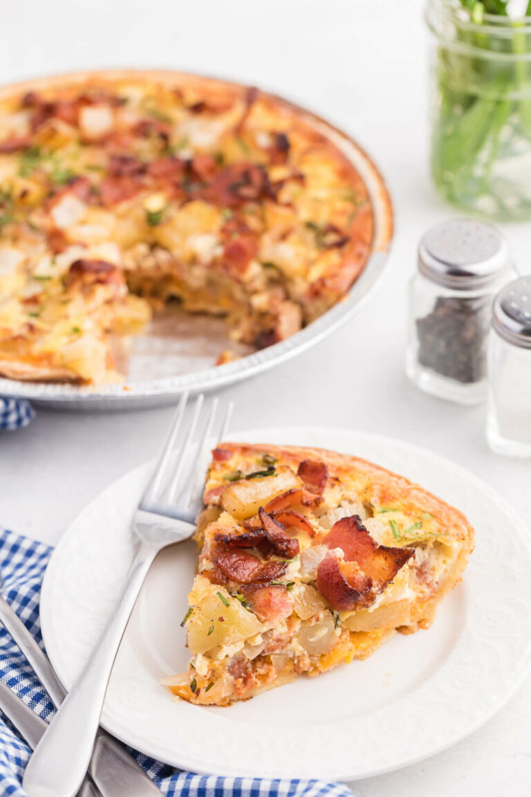 Bacon and Potato Quiche - Perfect for a St. Patrick's day brunch! A creamy, cheesy filling packed with hearty potatoes, bacon and fresh herbs.