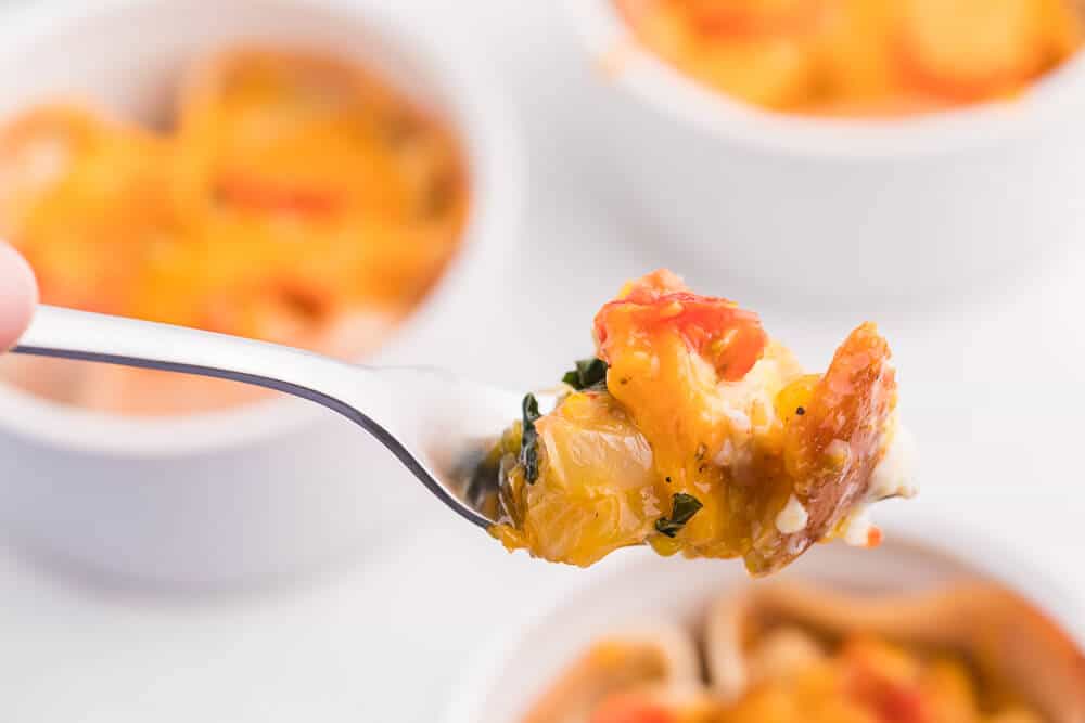 Chicken and Egg Ramekins - A brunch recipe your family will love! Chicken, eggs, cheese and fresh basil are baked to perfection in a ramekin.