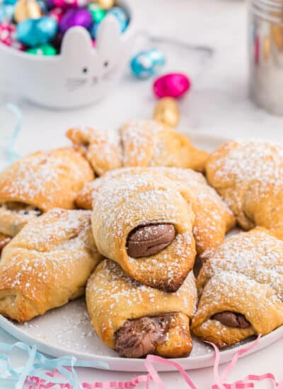 Easter egg stuffed crescent rolls on a plate.