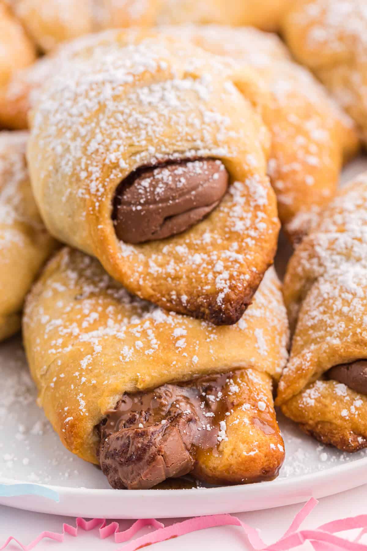 Easter egg stuffed crescent rolls on a white plate.