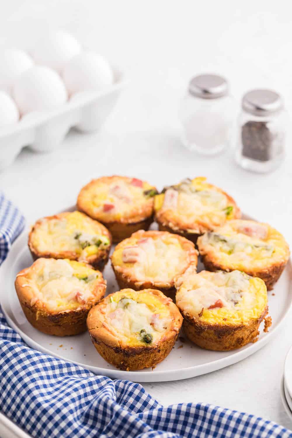 Ham, Asparagus & Swiss Biscuit Cups - These flaky bite-sized biscuits are loaded with ham, Swiss and asparagus, but can be completely customized to your family's taste buds!