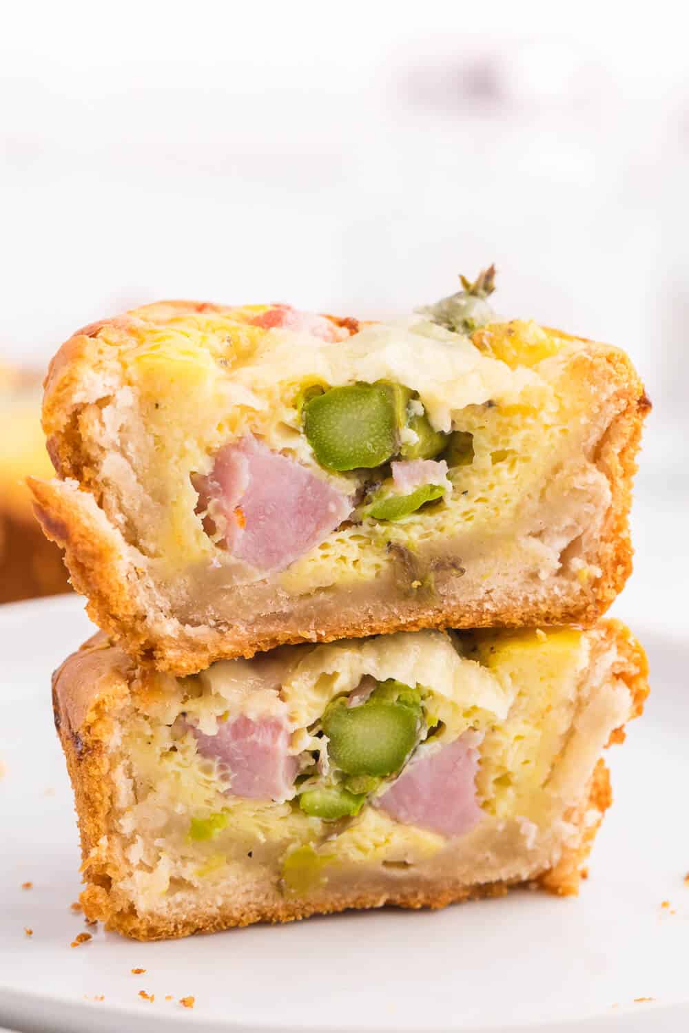 Ham, Asparagus & Swiss Biscuit Cups - These flaky bite-sized biscuits are loaded with ham, Swiss and asparagus, but can be completely customized to your family's taste buds!