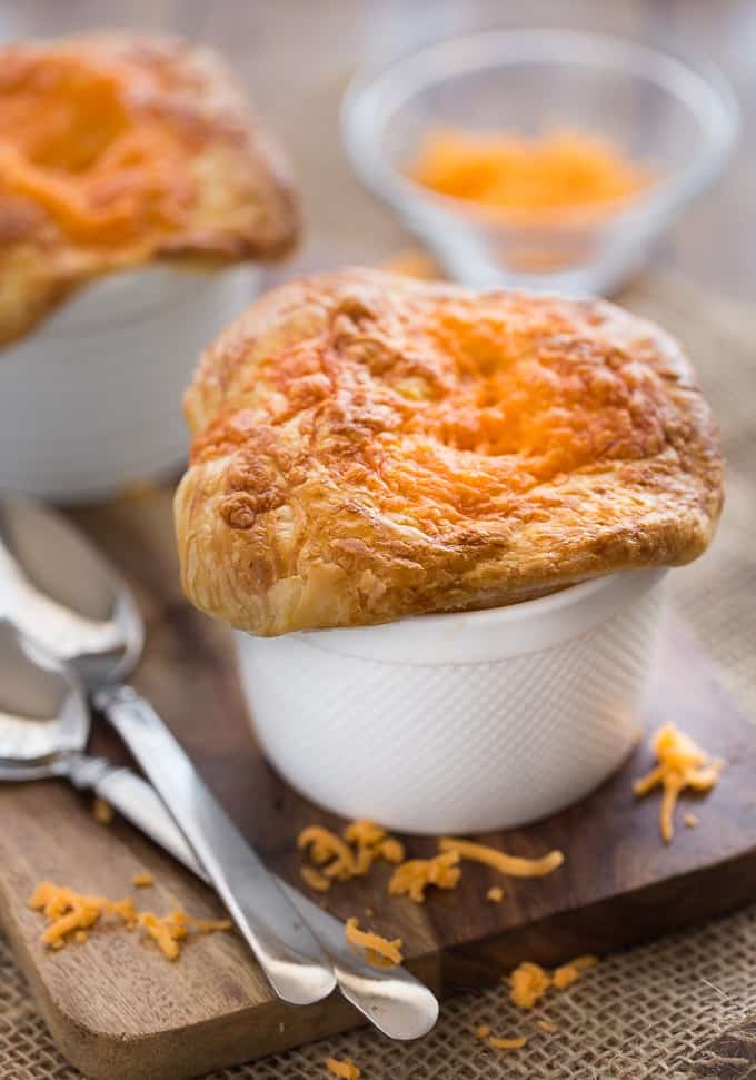 Chicken, Broccoli & Cheddar Pot Pies - Super cheesy and flavourful with a thick, creamy filling of savoury veggies, tender chicken and melted cheese baked in an ovenproof ramekin!