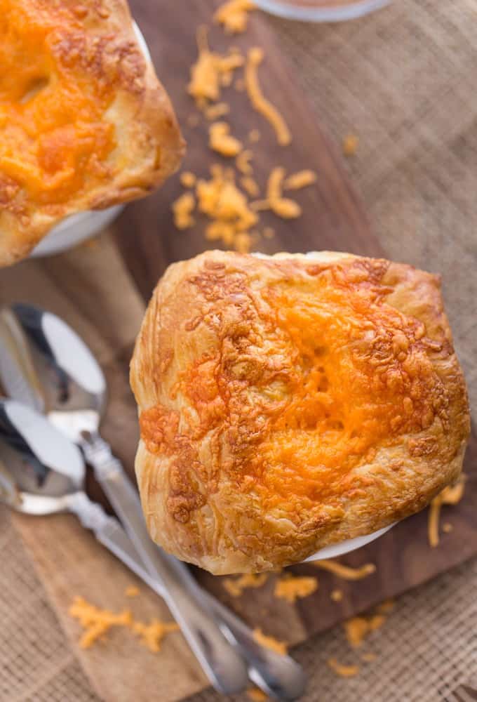 Chicken, Broccoli & Cheddar Pot Pies - Super cheesy and flavourful with a thick, creamy filling of savoury veggies, tender chicken and melted cheese baked in an ovenproof ramekin!