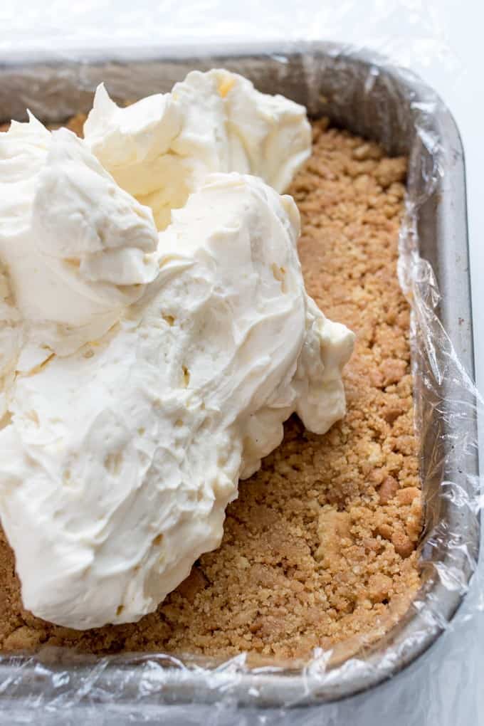 Cheesecake filling on a graham cracker crust.