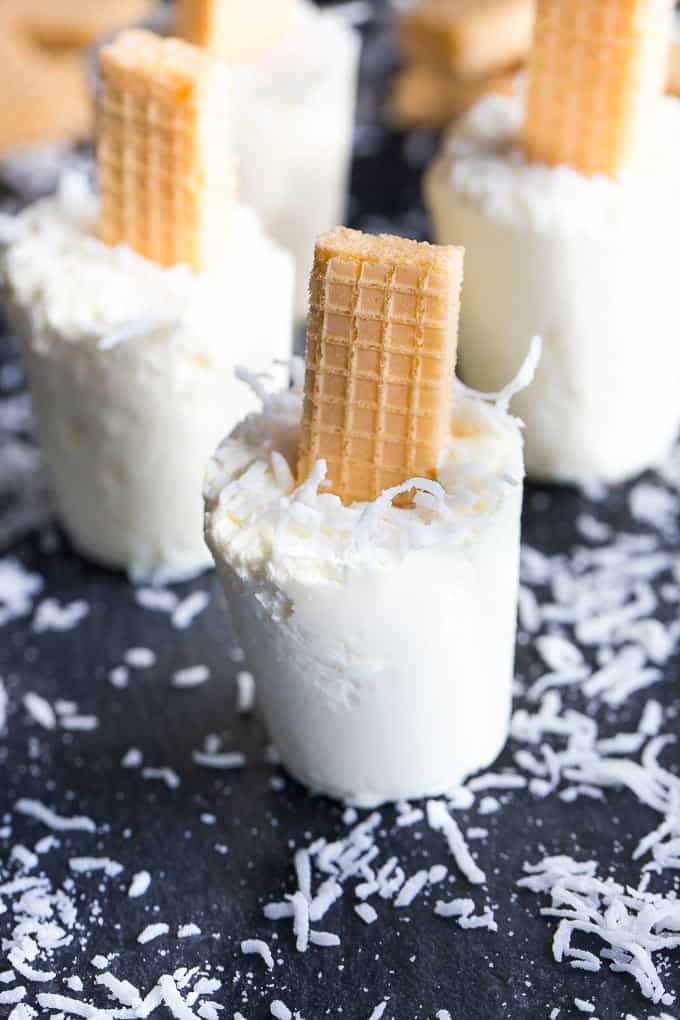 Coconut Creme Ice Pops - Cold, creamy and perfectly sweet! This summer treat tastes like a coconut cream pie.