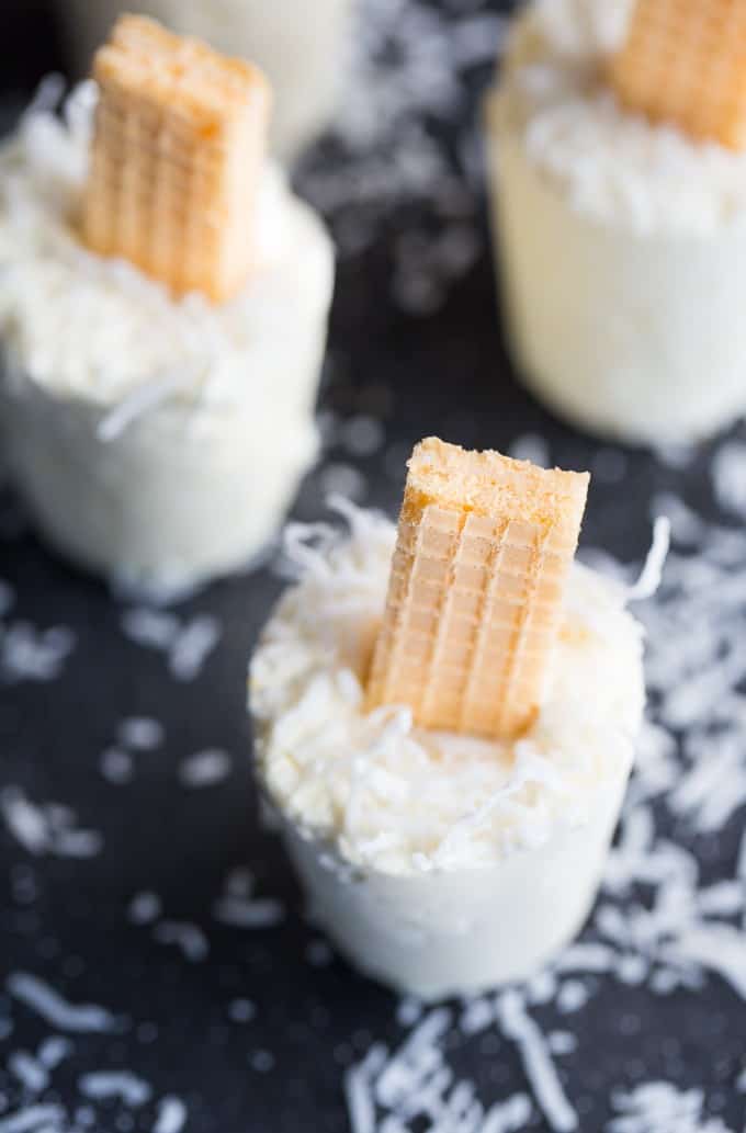 Coconut Creme Ice Pops - Cold, creamy and perfectly sweet! This summer treat tastes like a coconut cream pie.