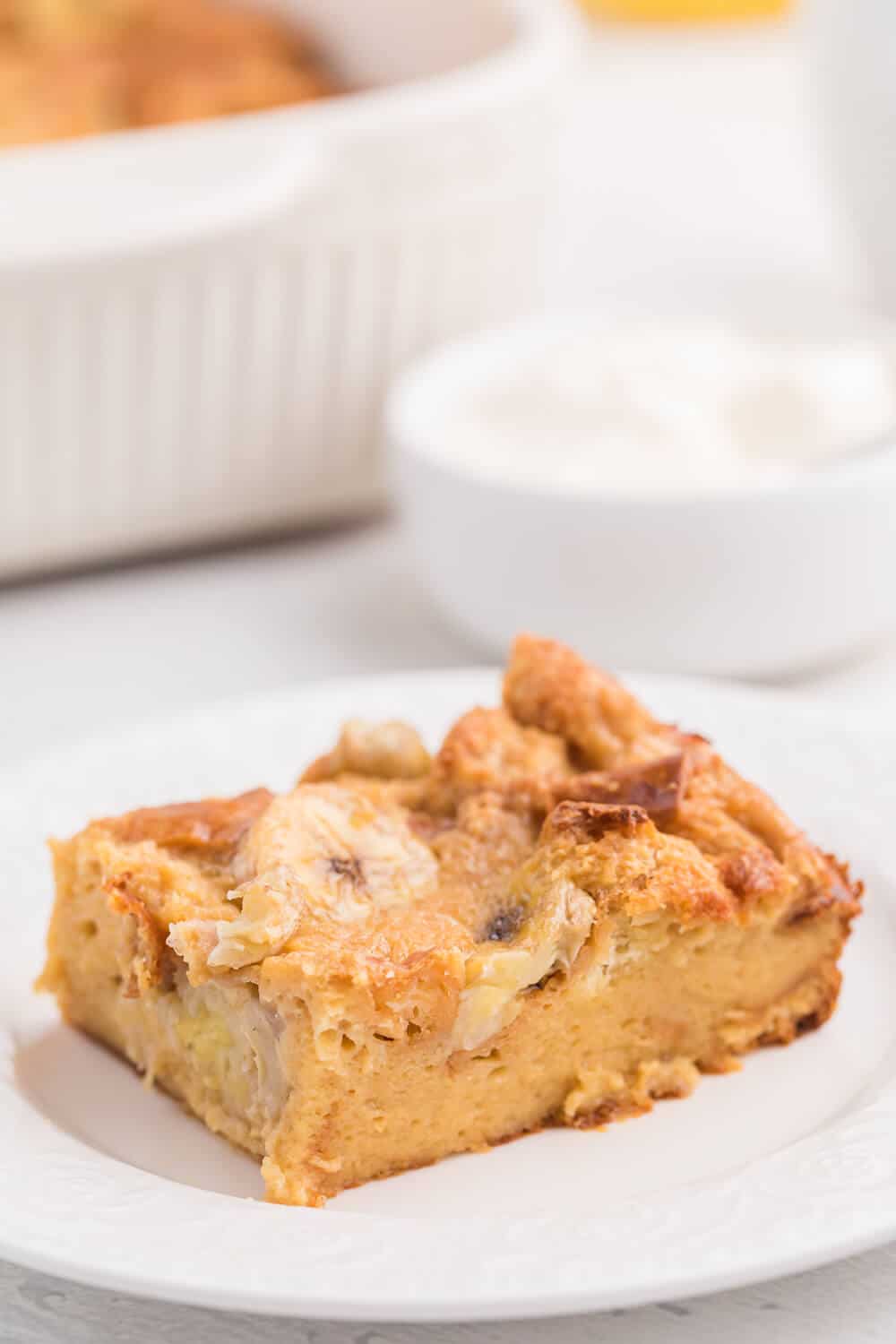 Banana Bread Breakfast Casserole - Use up your brown bananas and leftover bread in this crowd-pleasing breakfast recipe! It comes together in 10 minutes, bakes for 1 hour and is a recipe you'll find yourself making again and again.