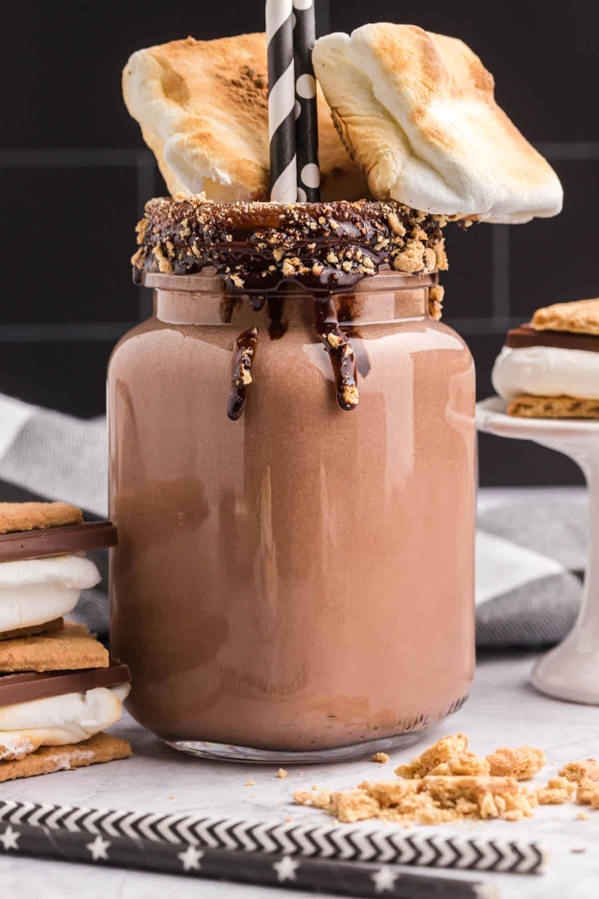 A S'mores coffee milkshake topped with marshmallows.