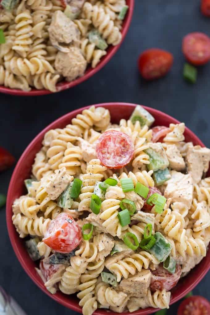 Grilled Butter Chicken Pasta Salad Recipe - Add a little Indian cuisine to your next BBQ! This creamy and mildly spicy salad is a whole meal with juicy chicken pieces in a savory dressing.