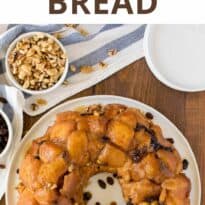 Classic Monkey Bread Recipe - Easy pull-apart bread swimming with walnuts, raisins, and a sweet glaze. Made for breakfast or dessert!