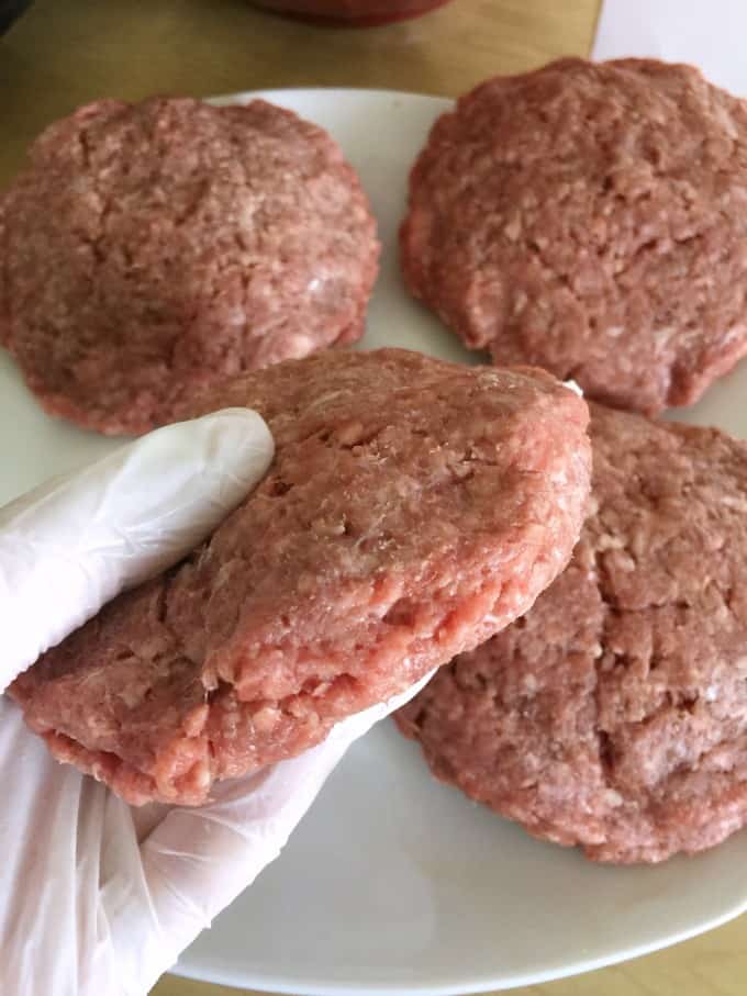 Cream Cheese Stuffed Jalapeno Burgers - Stuffed with a creamy, spicy and cheesy filling, this burger will light up your taste buds and make your mouth water!