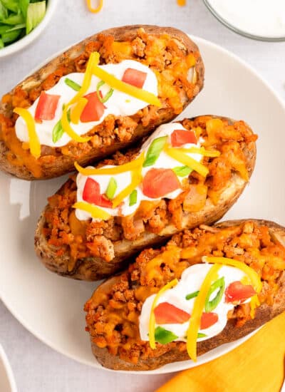 Chicken taco twice-baked potatoes on a plate.