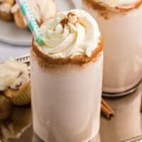 A milkshake on a tray.