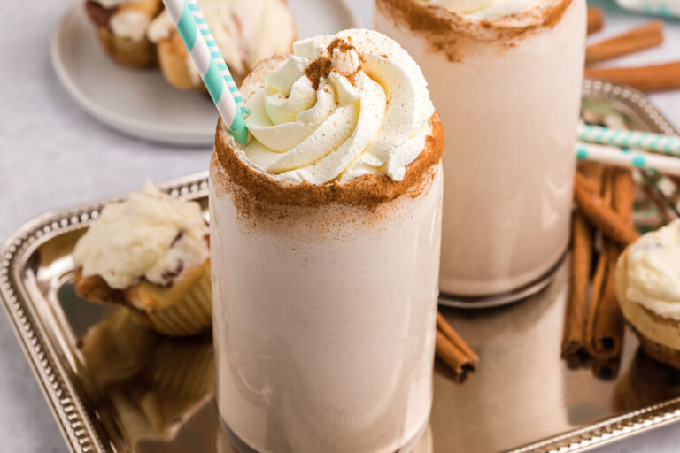 A milkshake on a tray.