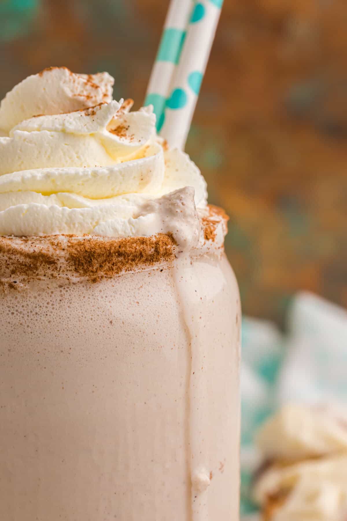 A close up of a cinnamon roll coffee milkshake recipe.