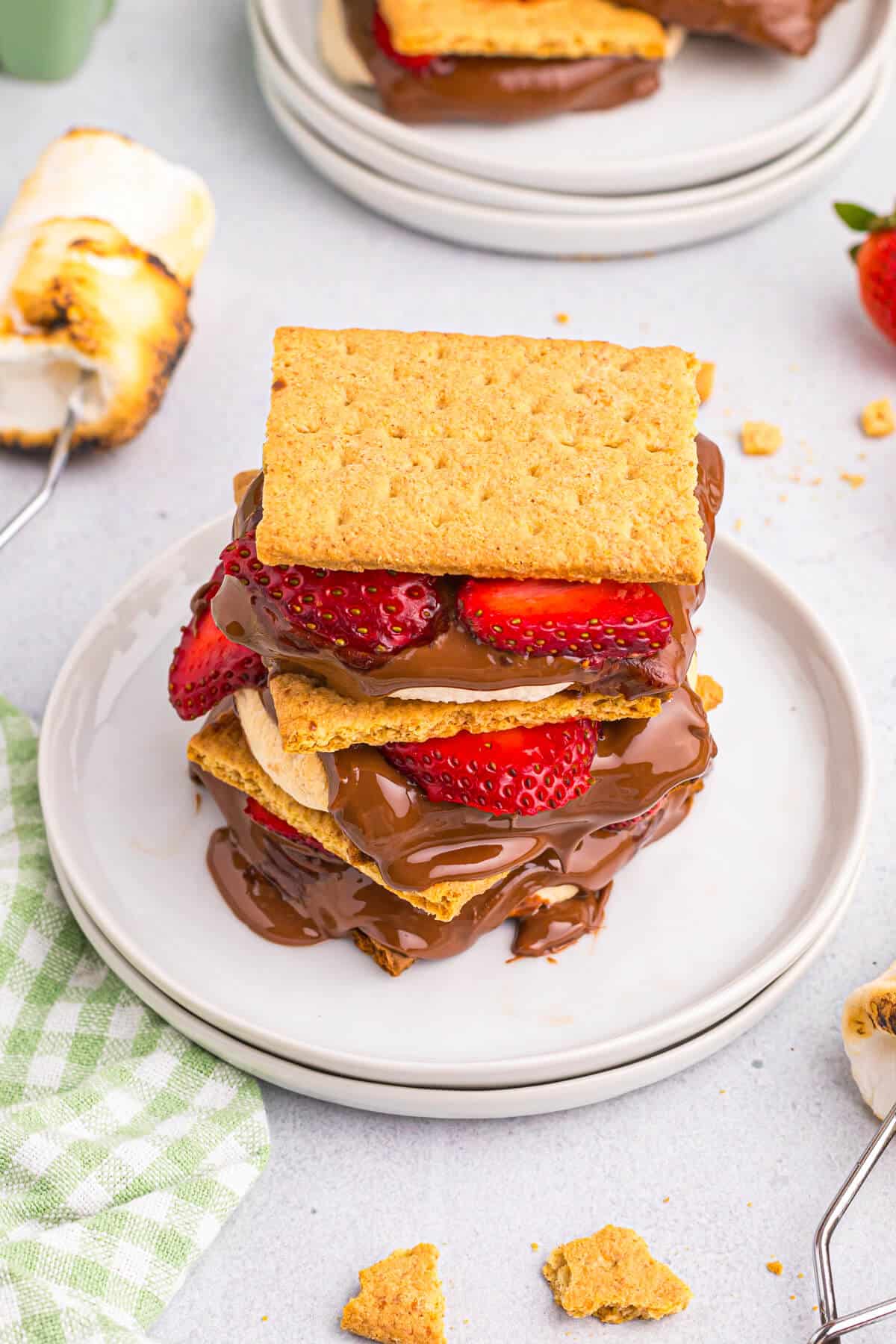 Strawberry s'mores on a plate.