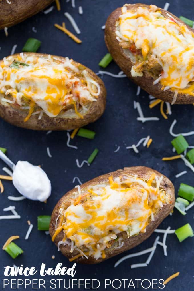 Twice Baked Pepper Stuffed Potatoes - The best twice baked potato recipe! Fill these fluffy potatoes with spicy peppers, cumin, chili powder, and sour cream.