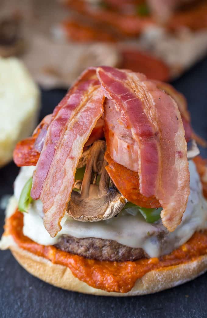 Deluxe Pizza Burgers - Loaded to the max with all your favourite pizza toppings. Take one bite and you'll see why my family raves about these delicious burgers!