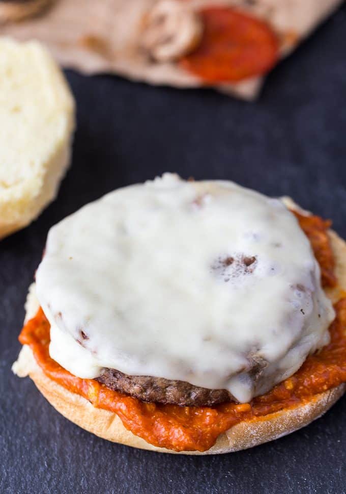 Deluxe Pizza Burgers - Loaded to the max with all your favourite pizza toppings. Take one bite and you'll see why my family raves about these delicious burgers!