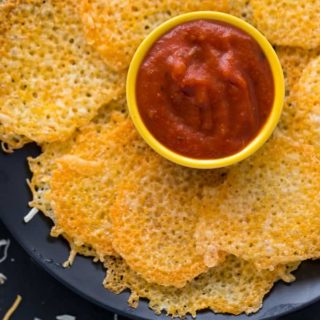 The recipe on a platter with pizza sauce.