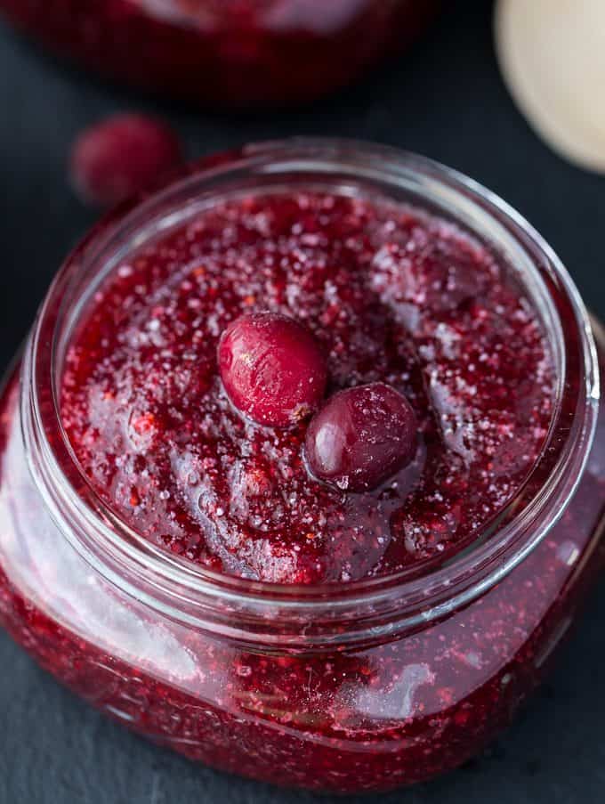 Cranberry Sugar Scrub -Save some of those holiday cranberries in your freezer and use them in this simple DIY sugar scrub recipe!