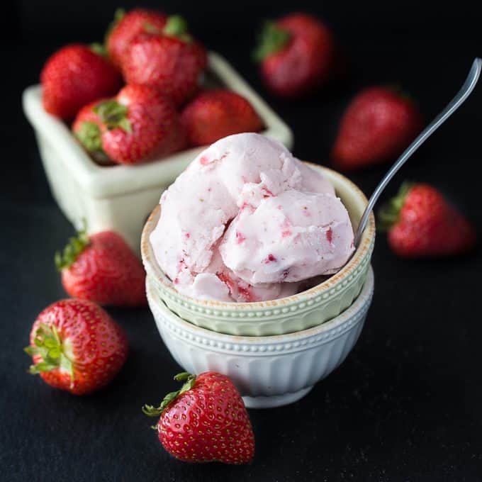 Strawberry Ice Cream - So creamy, sweet and luscious! This fresh ice cream recipe is ready in a matter of hours and super simple to make at home with your ice cream maker.