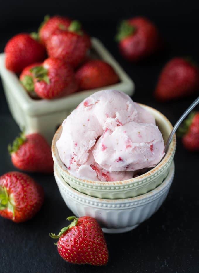 Strawberry Ice Cream - So creamy, sweet and luscious! This fresh ice cream recipe is ready in a matter of hours and super simple to make at home with your ice cream maker.