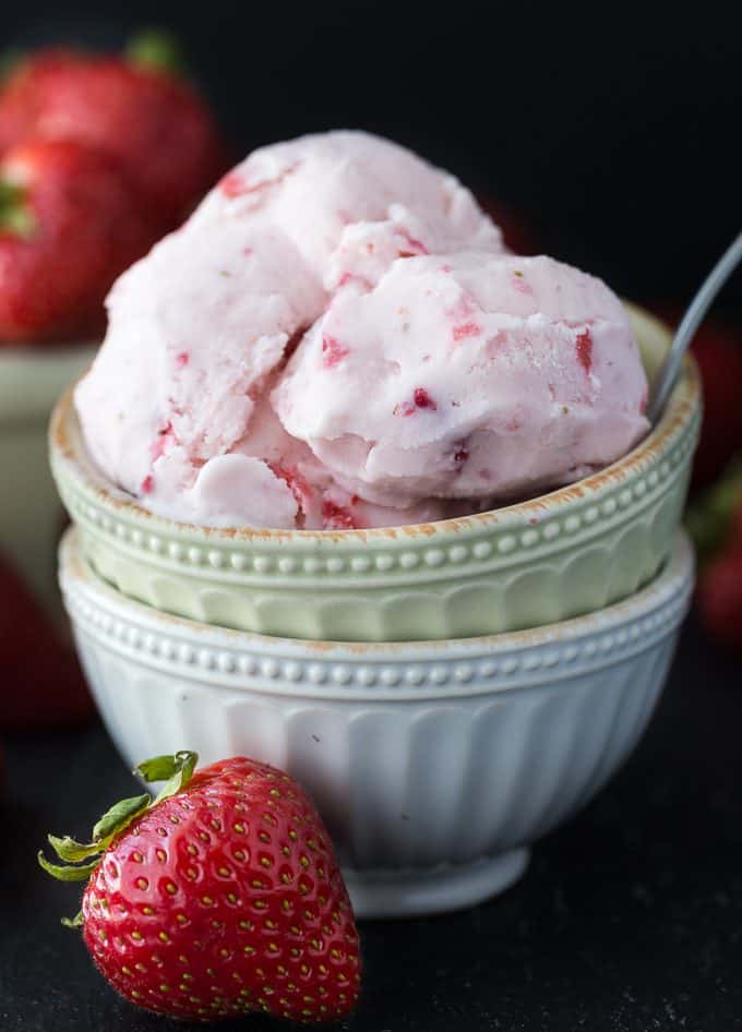 Strawberry Ice Cream - So creamy, sweet and luscious! This fresh ice cream recipe is ready in a matter of hours and super simple to make at home with your ice cream maker.