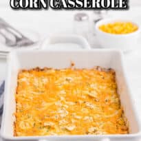 cheesy corn casserole in a white casserole pan