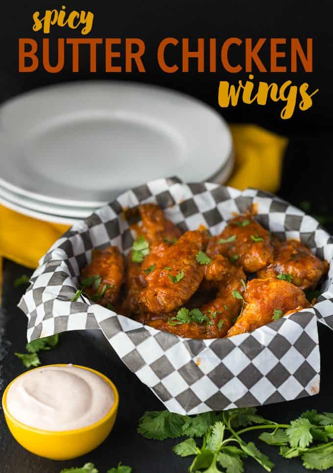 Spicy Butter Chicken Wings - Take your tailgate to India! These game day treats pack a little heat and a ton of flavor with a delicious dipping sauce.
