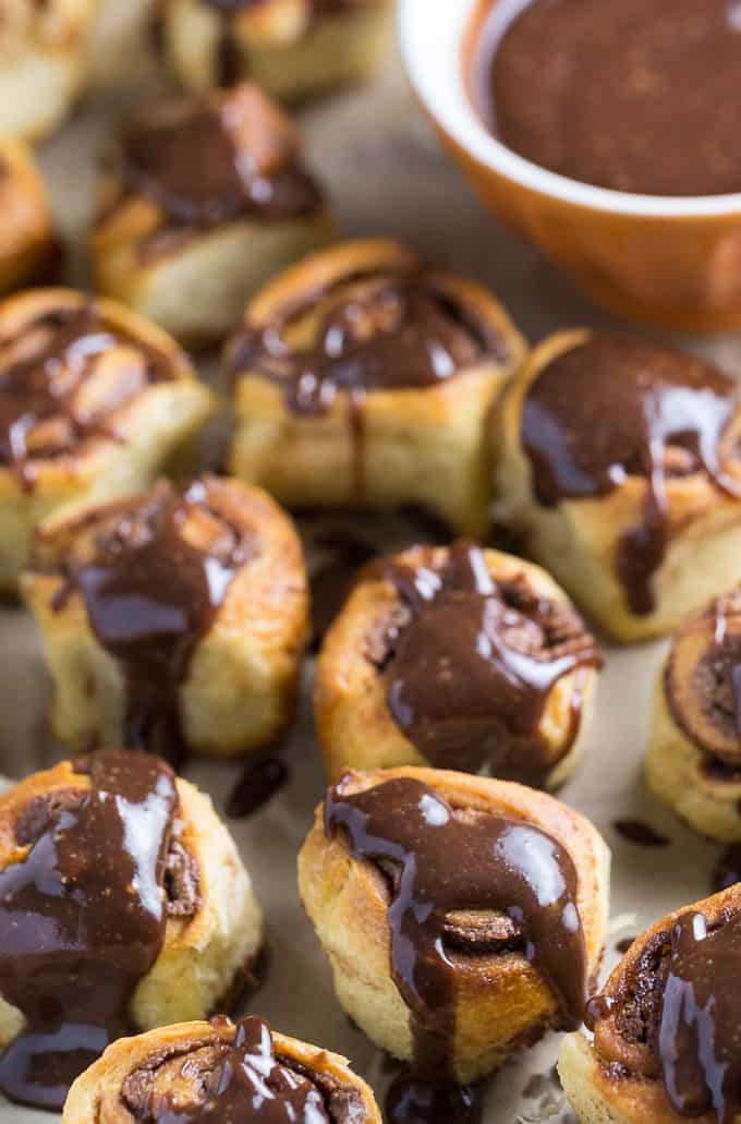 REESE Rolls - Similar to cinnamon rolls, but filled with a chocolate/peanut butter spread and topped with an equally rich glaze. You'll be glad this recipe makes 18 rolls!