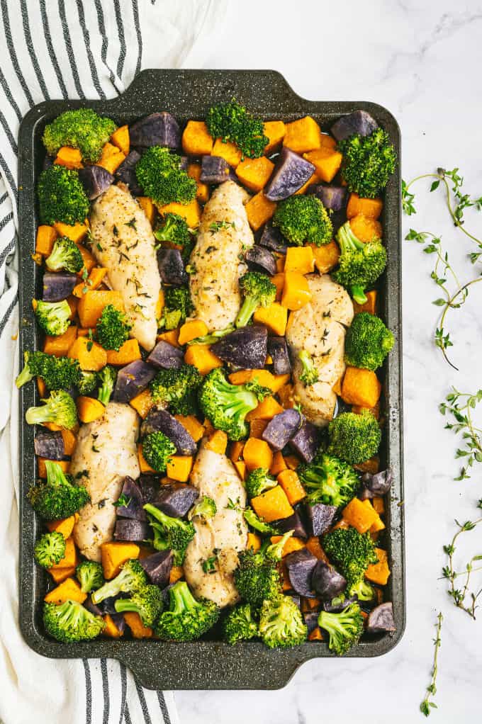 One-Pan Maple Dijon Chicken - This one-pan meal is perfect for those busy weeknights. You'll love the tender chicken baked with butternut squash, purple potatoes and broccoli roasted to perfection.