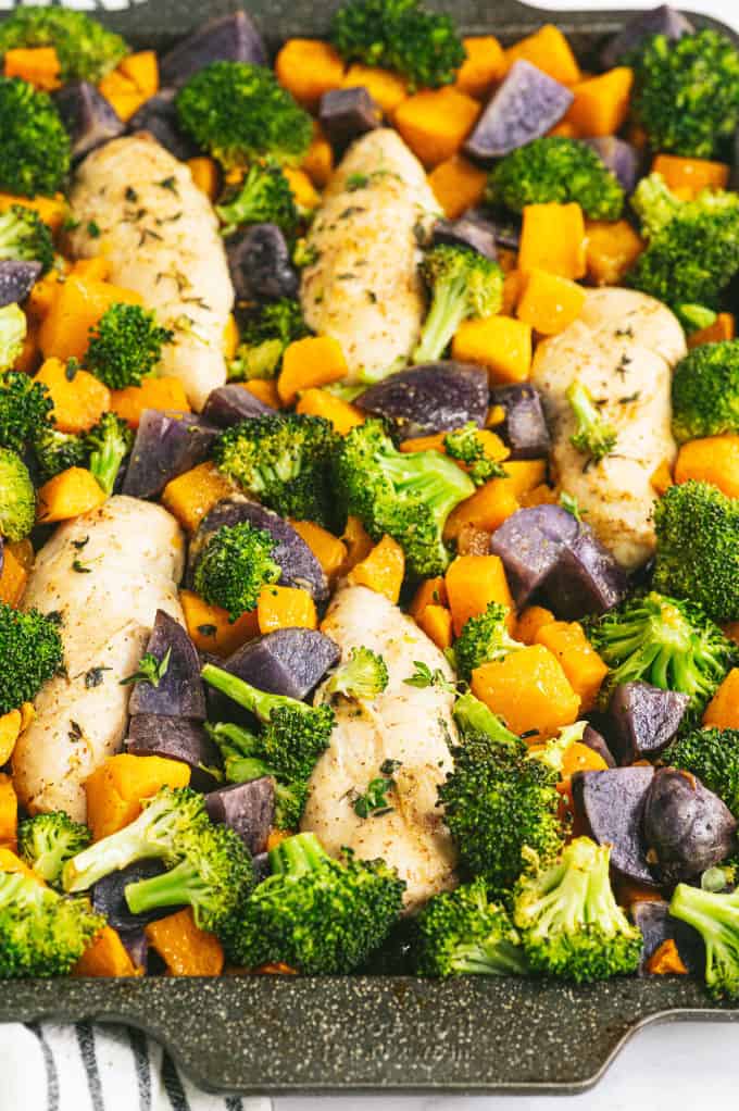 One-Pan Maple Dijon Chicken - This one-pan meal is perfect for those busy weeknights. You'll love the tender chicken baked with butternut squash, purple potatoes and broccoli roasted to perfection.