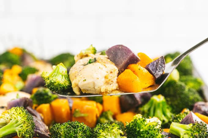 One-Pan Maple Dijon Chicken - This one-pan meal is perfect for those busy weeknights. You'll love the tender chicken baked with butternut squash, purple potatoes and broccoli roasted to perfection.