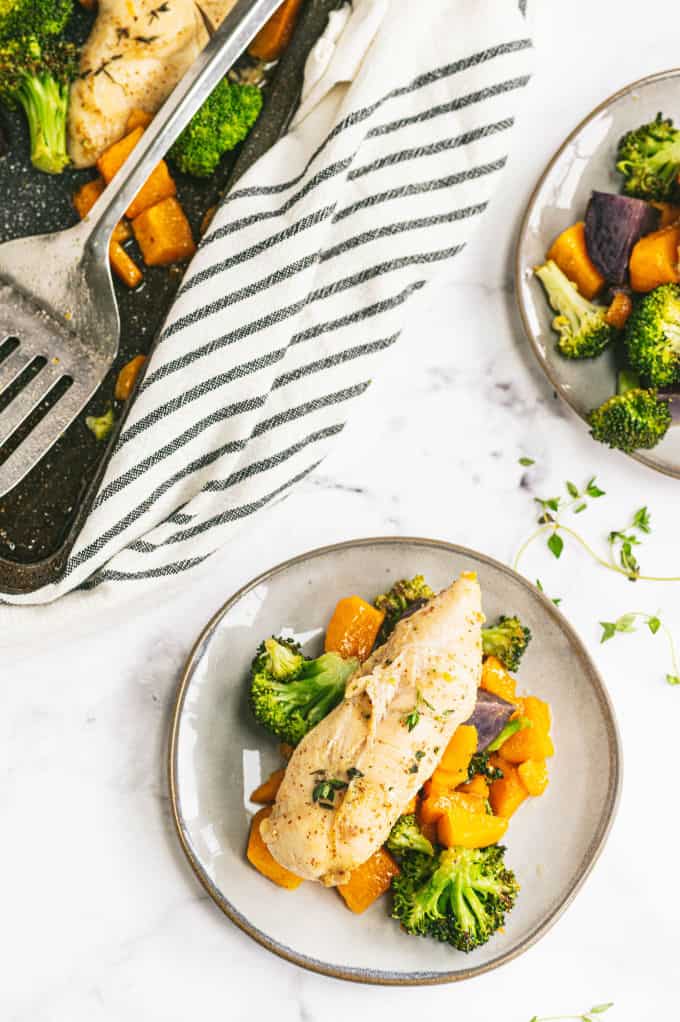 One-Pan Maple Dijon Chicken - This one-pan meal is perfect for those busy weeknights. You'll love the tender chicken baked with butternut squash, purple potatoes and broccoli roasted to perfection.