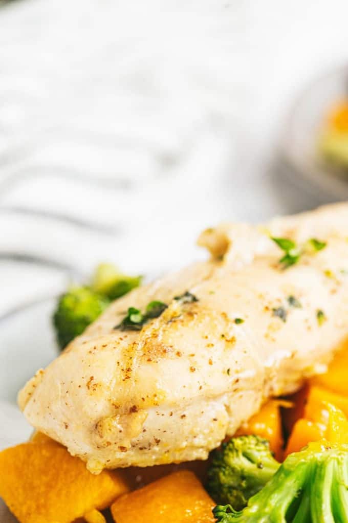 One-Pan Maple Dijon Chicken - This one-pan meal is perfect for those busy weeknights. You'll love the tender chicken baked with butternut squash, purple potatoes and broccoli roasted to perfection.