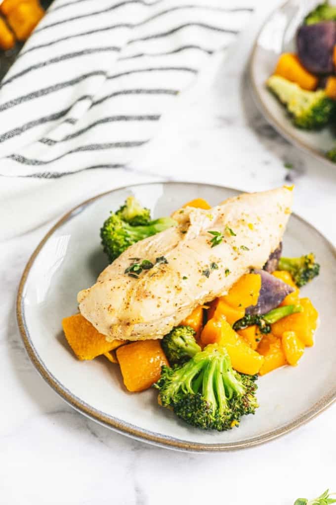 One-Pan Maple Dijon Chicken - This one-pan meal is perfect for those busy weeknights. You'll love the tender chicken baked with butternut squash, purple potatoes and broccoli roasted to perfection.