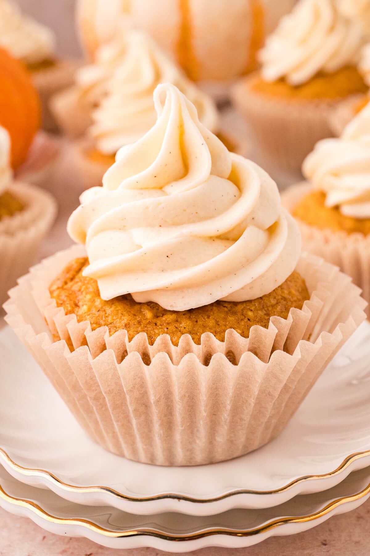 A cupcake on a plate.
