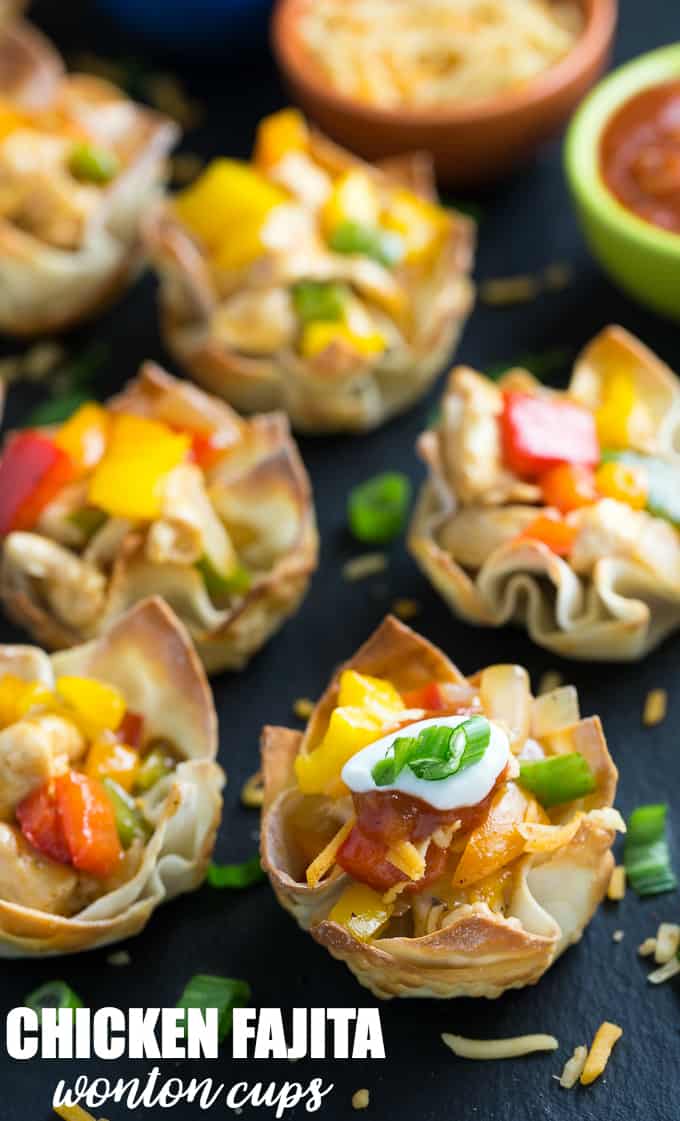 Chicken Fajita Wonton Cups - A little East, a little West. These appetizer cups are perfect for entertaining with a festive Mexican filling in a crunchy wonton.
