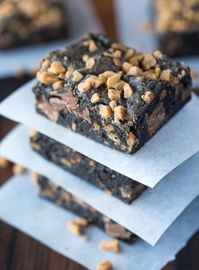 Chocolate Chewy Bars - Four-ingredient dessert! This delicious and decadent dessert is filled with Oreo crumbs, condensed milk, chocolate chips and toffee.