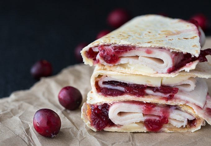 Turkey Cranberry & Brie Quesadillas - The best Thanksgiving leftover sandwich EVER. Wrap up all your holiday favorites with some melty brie in a warm tortilla.