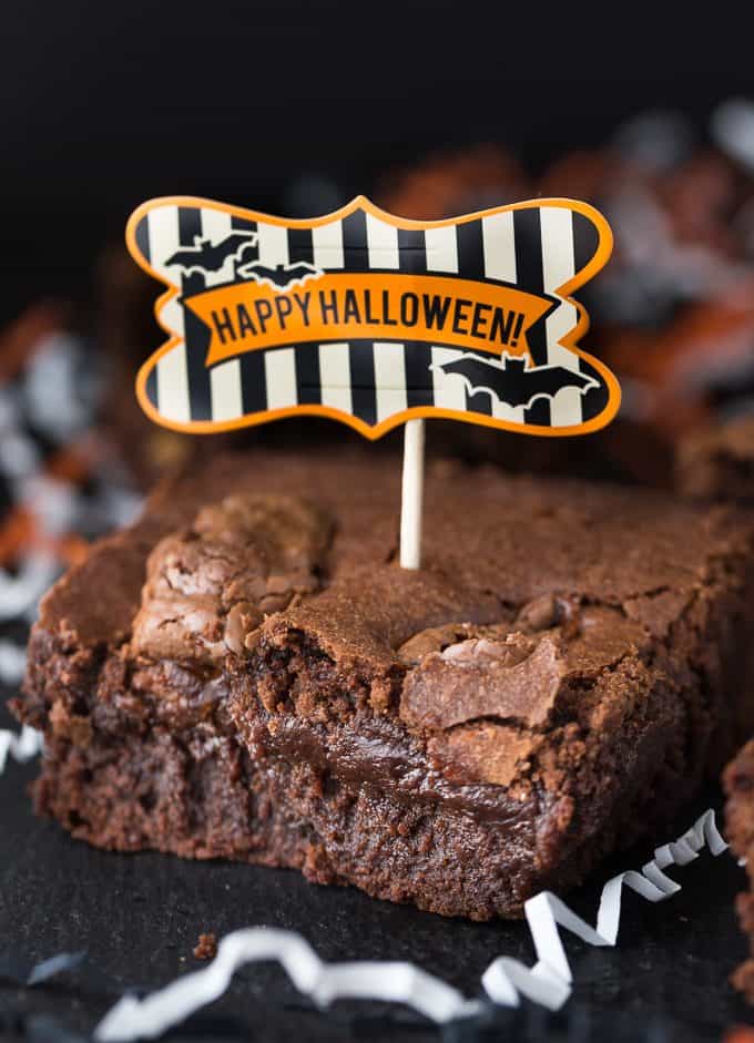 Halloween Brownies - Turn that Halloween candy into something more decadent! These brownies are just a hiding place for candy bars.