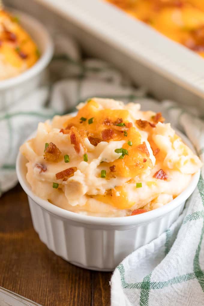 Twice Baked Potato Casserole - Far less labour intensive than traditional twice-baked potatoes, but with all the cheese, bacon and green onion flavours you love. This side dish pairs well with everything!