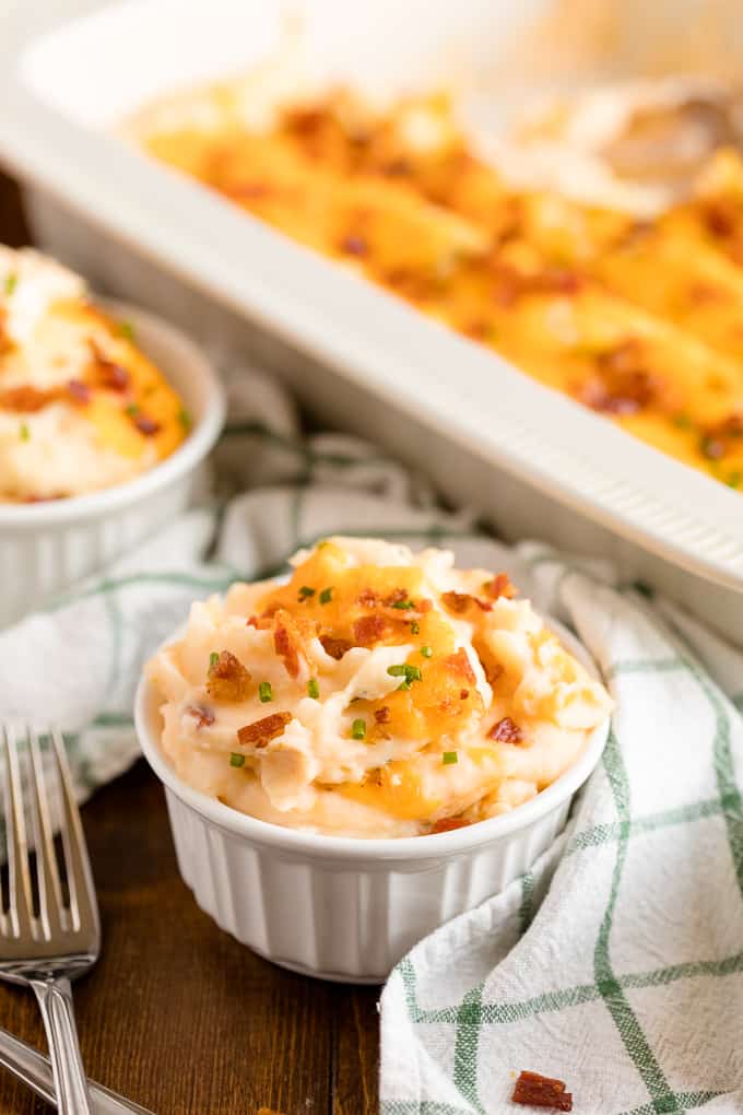 Twice Baked Potato Casserole - Far less labour intensive than traditional twice-baked potatoes, but with all the cheese, bacon and green onion flavours you love. This side dish pairs well with everything!