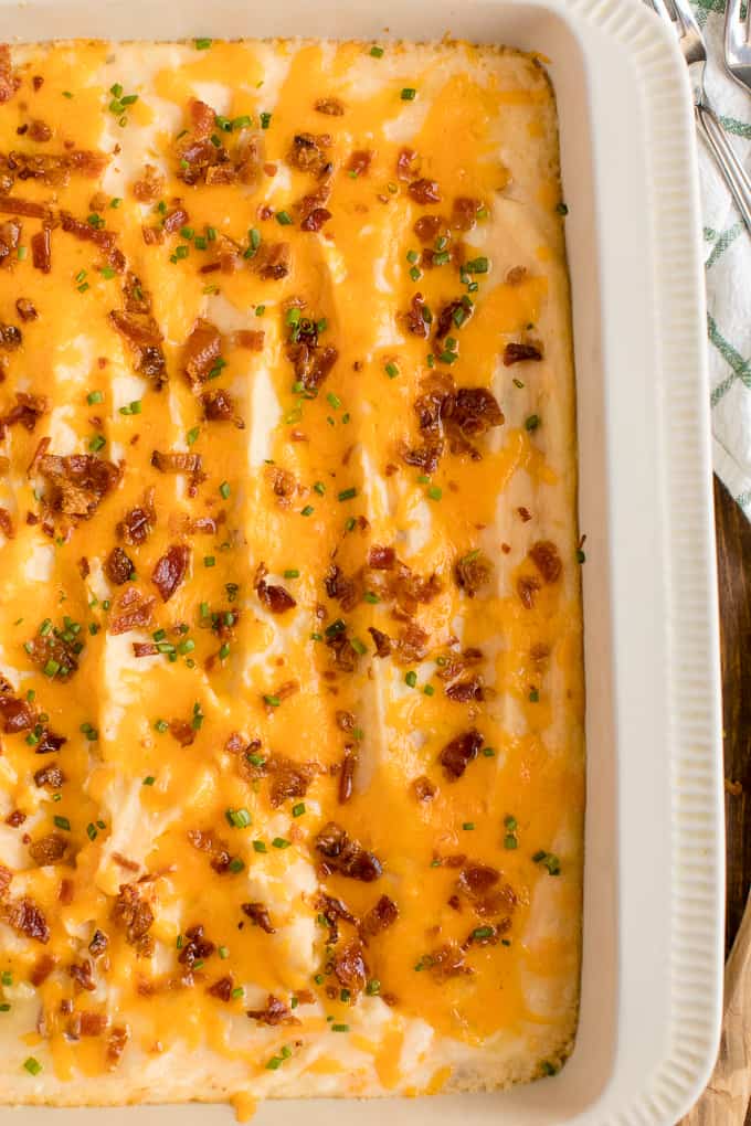 Twice Baked Potato Casserole - Far less labour intensive than traditional twice-baked potatoes, but with all the cheese, bacon and green onion flavours you love. This side dish pairs well with everything!