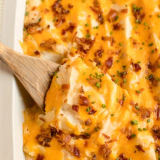 The recipe in a pan with a wooden spoon.