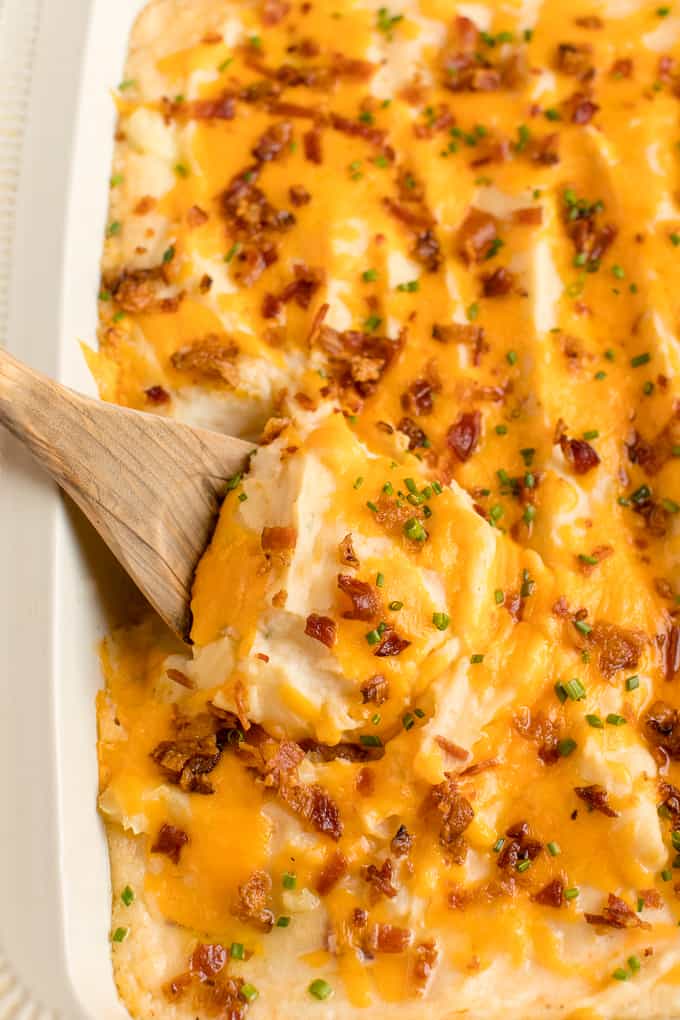 Twice Baked Potato Casserole - Far less labour intensive than traditional twice-baked potatoes, but with all the cheese, bacon and green onion flavours you love. This side dish pairs well with everything!