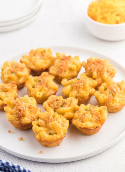 Mac and Cheese Cups - Comfort food in a cup! The perfect cozy, cheesy side dish, but handheld for appetizers and tailgating.